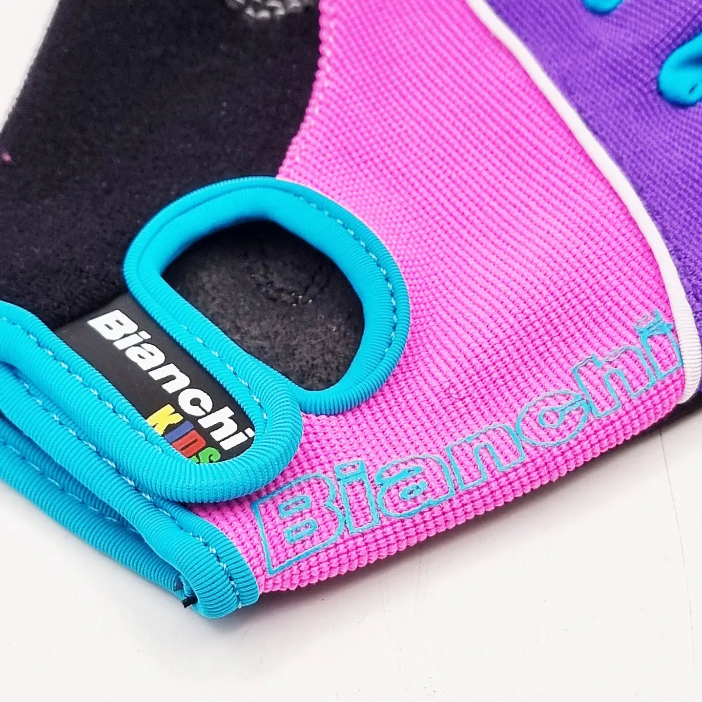 GUANTE BIANCHI NIÑA PURPLE/MAGENTA
